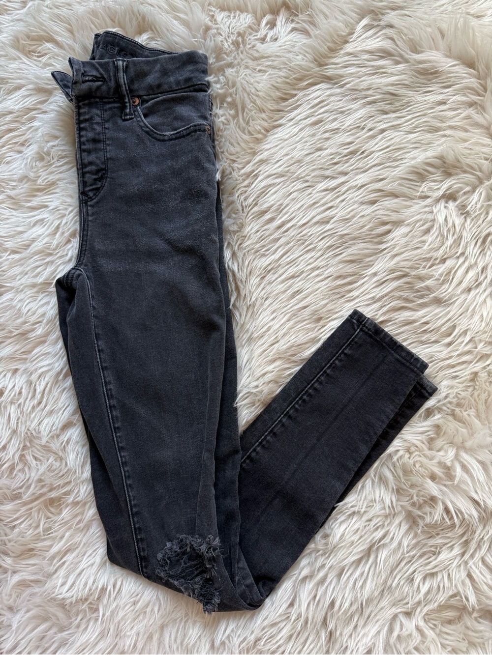 American Eagle Outfitters Black Skinny Jeans with Distressed Hem